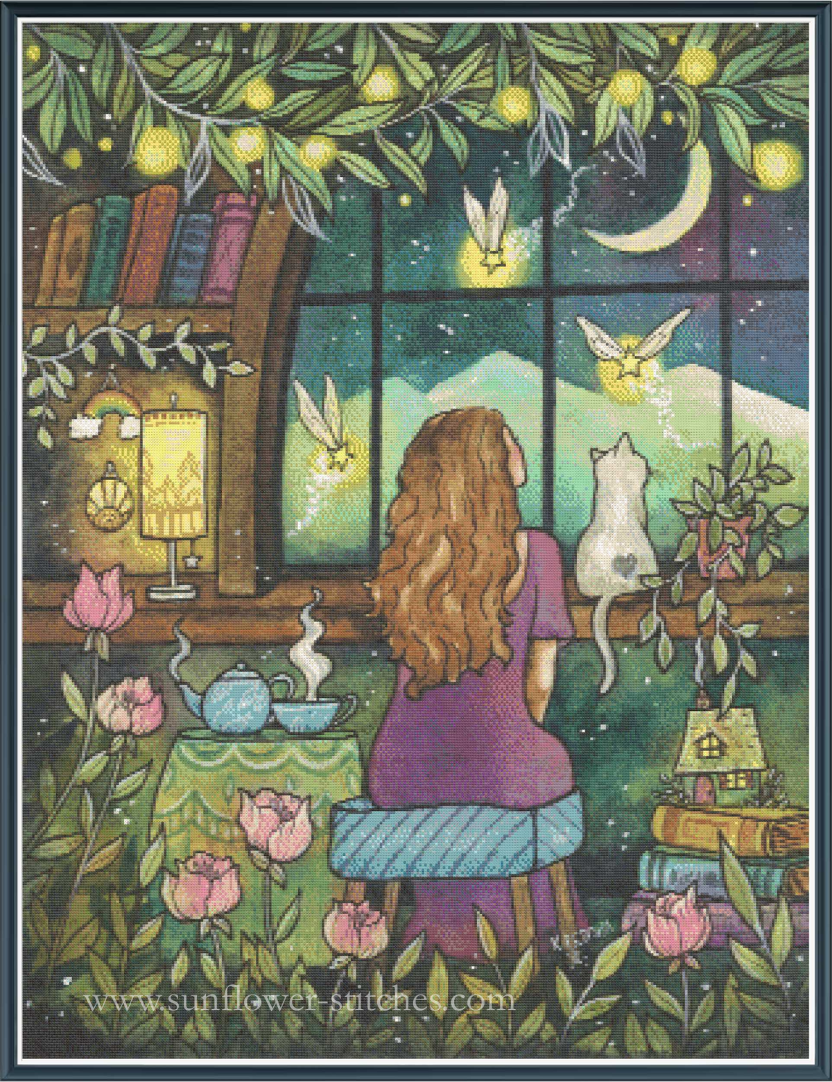A whimsical cross stitch showing a woman with long wavy hair sitting by a window, looking out at a night sky with a crescent moon and glowing fairies, while a white cat sits beside her. The artwork includes a bookshelf, books, flowers, plants, and a cozy interior setting