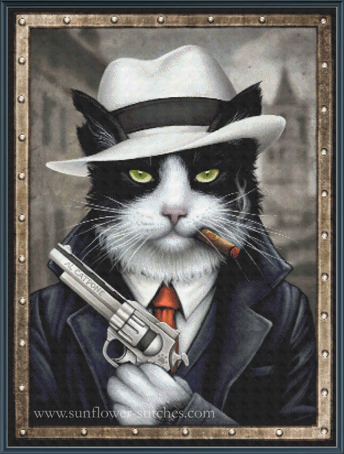 A framed cross stitch depicting a black and white cat dressed in a white fedora, dark coat, white shirt, and red tie, holding a revolver and smoking a cigar.