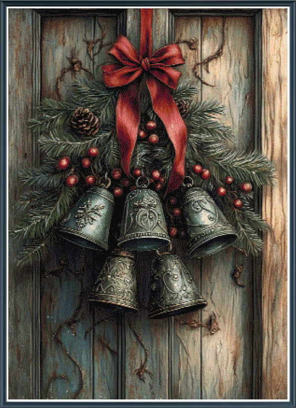 Stamped cross stitch design of a Decorative Christmas scene with bells, pine cones, and a red ribbon on a wooden background