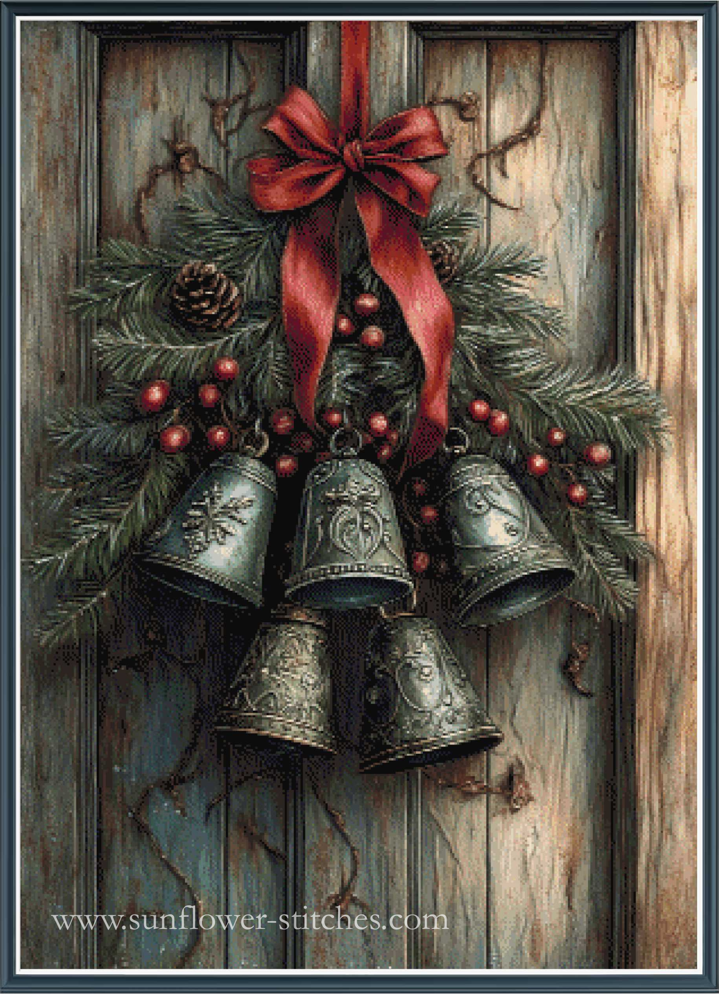 A festive Christmas wreath with five hanging metal bells, red berries, pinecones, and a large red ribbon bow, displayed against a weathered wooden door. 