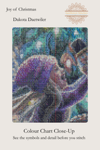 Joy of Christmas cross stitch colour chart symbol preview showing counted stitched grid detail of a child's face and purple hat, Sunflower Stitches.