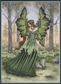 Fairy in a green dress with butterfly wings standing in a forest setting