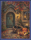Moonlight and Pumpkin Dreams cross stitch pattern mockup featuring an autumn cottage doorstep with a black cat in a basket, carved pumpkins, lanterns, and candles, artwork by Ricco.