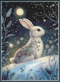 Stamped cross stitch mockup showing a licensed images of a White rabbit  under a moonlit sky with flowers and leaves.