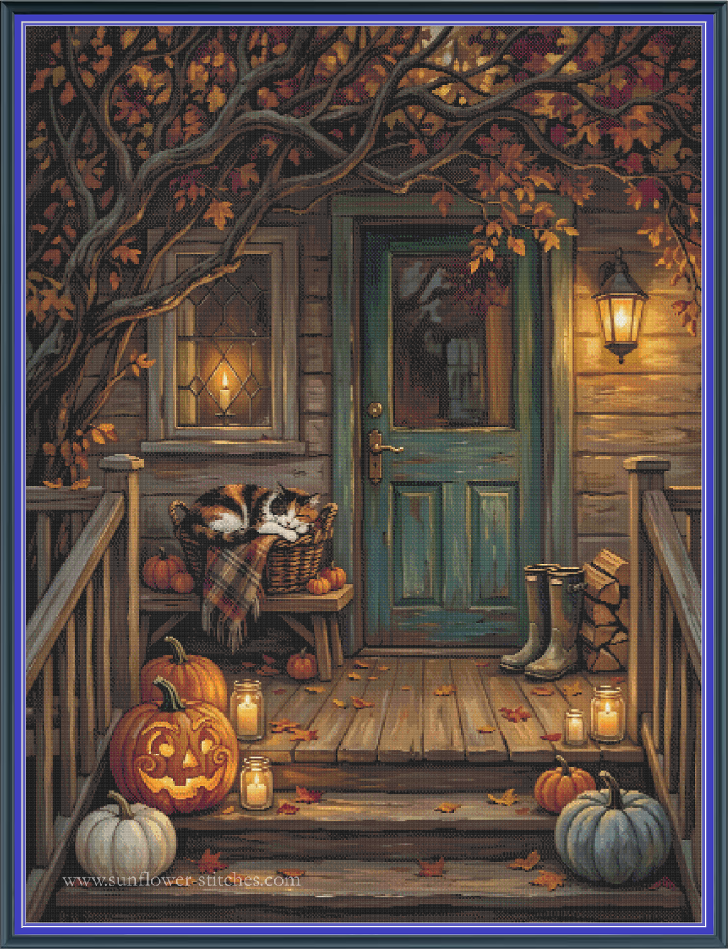 A cross stitch mock-up featuring a cozy autumn porch scene artwork showing a wooden door, lanterns, pumpkins, fallen leaves, boots, and a sleeping cat in a basket. The scene is framed by a blue border. 