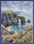 Watercolor landscape painting of a coastal cliff scene with a natural rock arch over turquoise water, surrounded by green cliffs, pink wildflowers, and a cloudy sky, framed by a blue border.