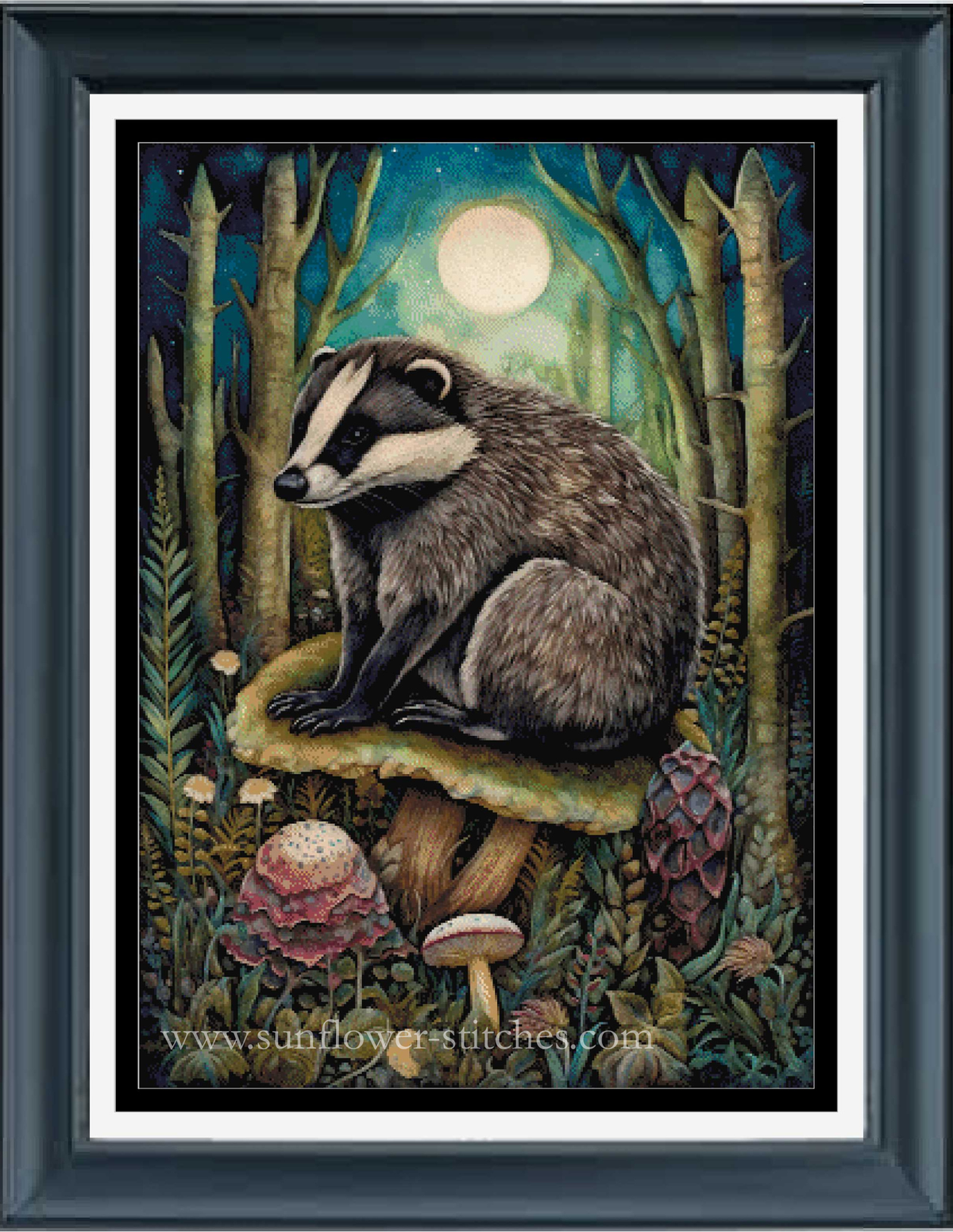Framed cross stitch featuring a detailed illustration of a badger sitting on a mushroom in a moonlit forest