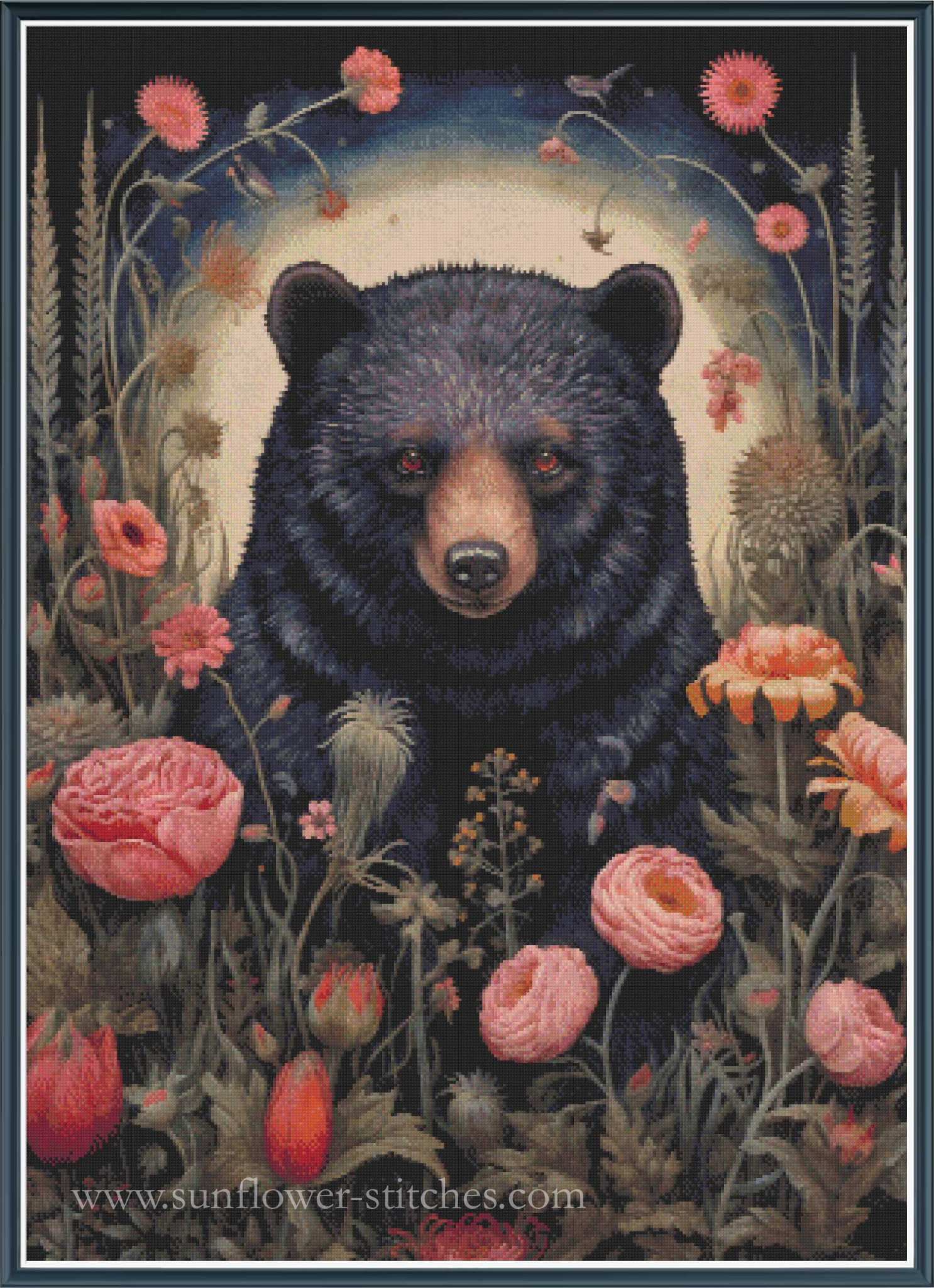 A cross stitch featuring a black bear surrounded by pink flowers and wild plants, with a pale glowing circle behind the bear. The text 'www.