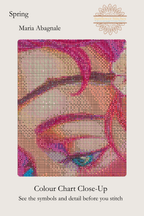 Spring colour chart close-up, showing stitch symbols over the woman’s eye and pink hair, Sunflower Stitches.