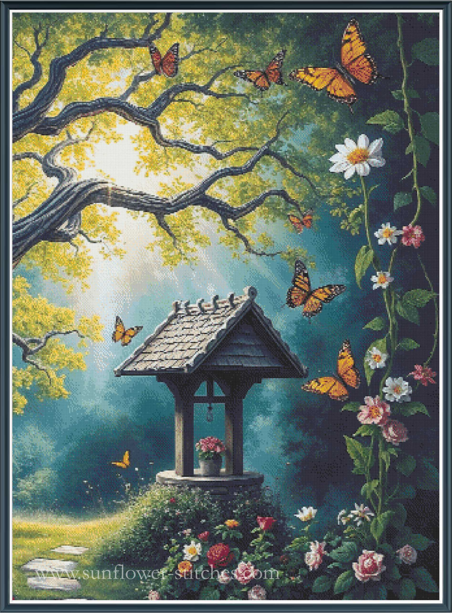 A full coverage cross stitch featuring a whimsical garden scene with a small wooden wishing well, vibrant orange butterflies, white and pink flowers, and a large tree with sunbeams filtering through the leaves.
