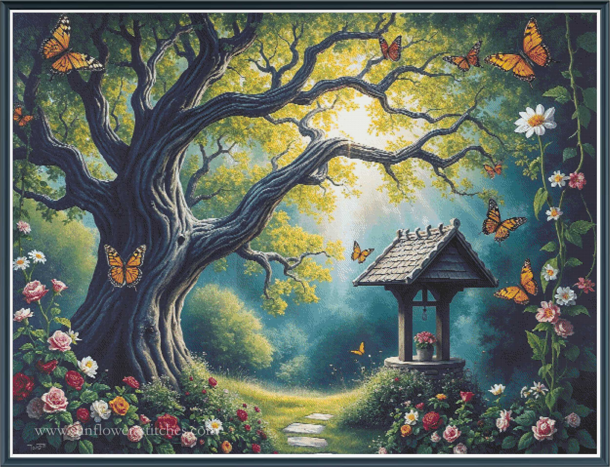 A fantasy-style garden scene cross stitch featuring a large gnarled tree with glowing yellow-green leaves, orange butterflies, a small stone well with a roof, a winding path, and abundant roses. The scene fills nearly the entire frame with a thin dark border.